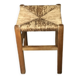 Wooden stool with straw seat