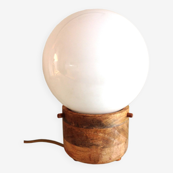 White opaline globe lamp on wooden base