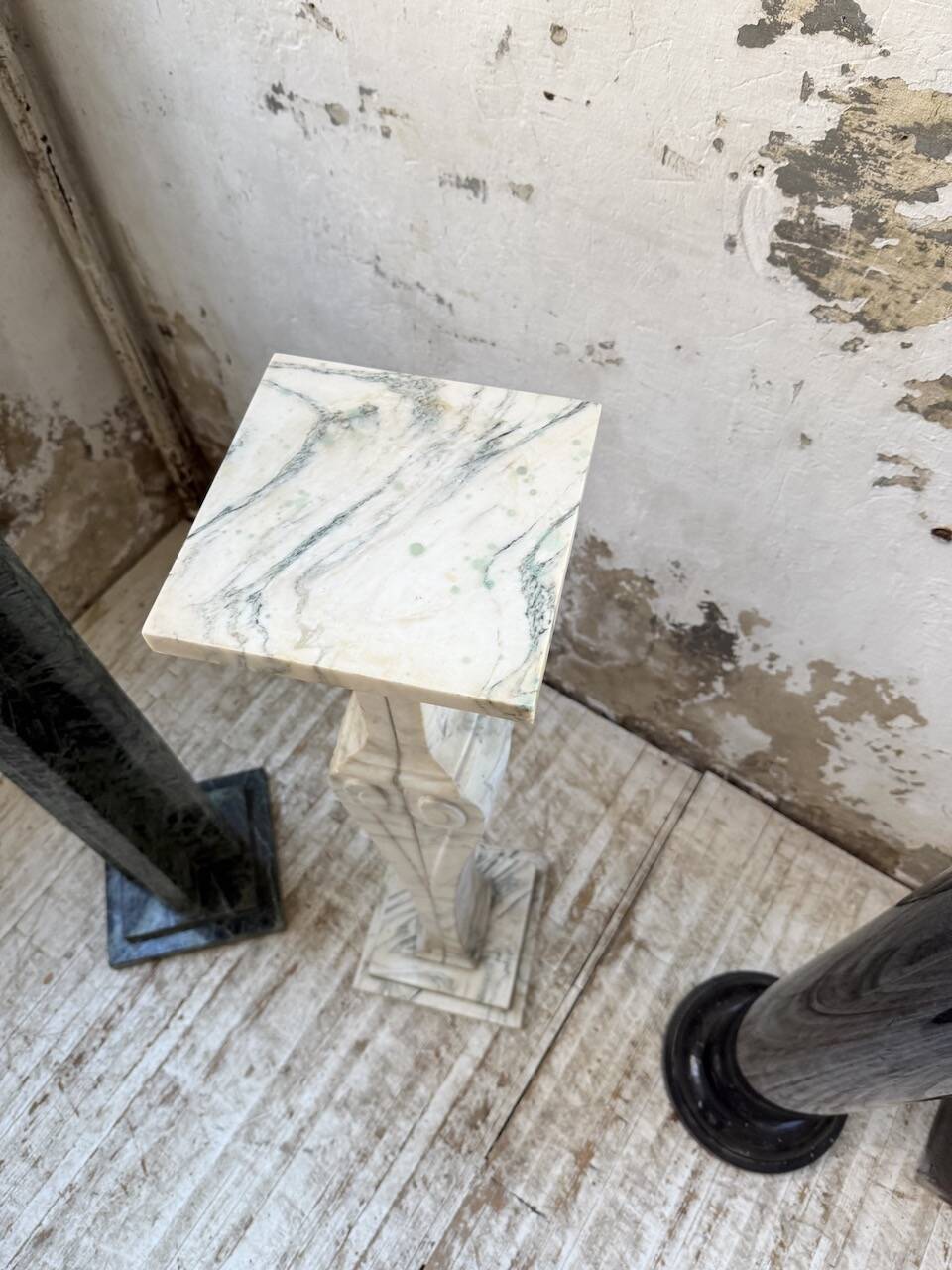 Set of 4 marble columns or pedestals.