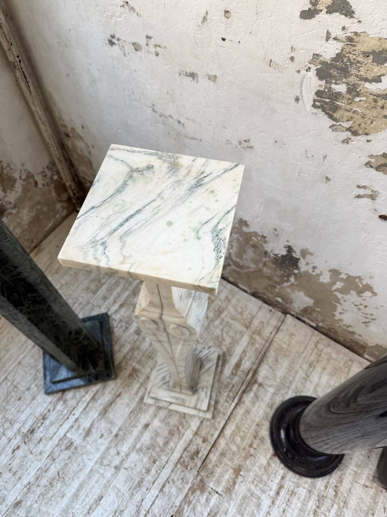 Set of 4 marble columns or pedestals.