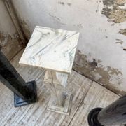 Set of 4 marble columns or pedestals.