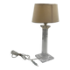 Modern table lamp in plexiglass with fabric shade.