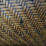 Woven rattan armchair and exotic wood - Colonial style - 1980s