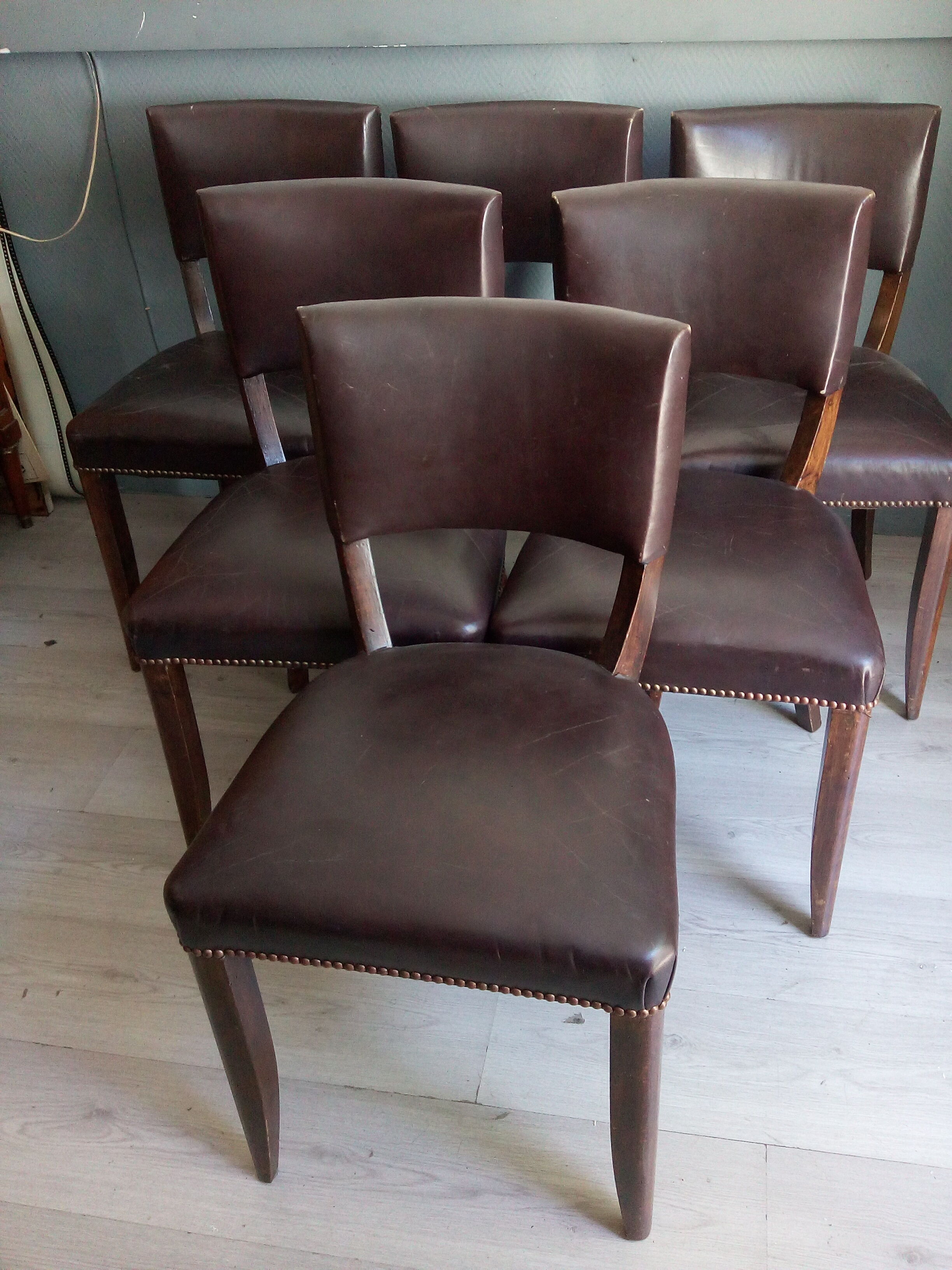 Lot of leather and vintage wood chairs