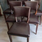 Lot of leather and vintage wood chairs