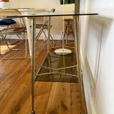 Vintage brass and smoked glass dessert trolley on wheels.