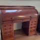 Beautiful vintage 20th-century American cylinder desk and its chair.