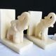 Elephant bookends in alabaster, Pair of elephant bookends.