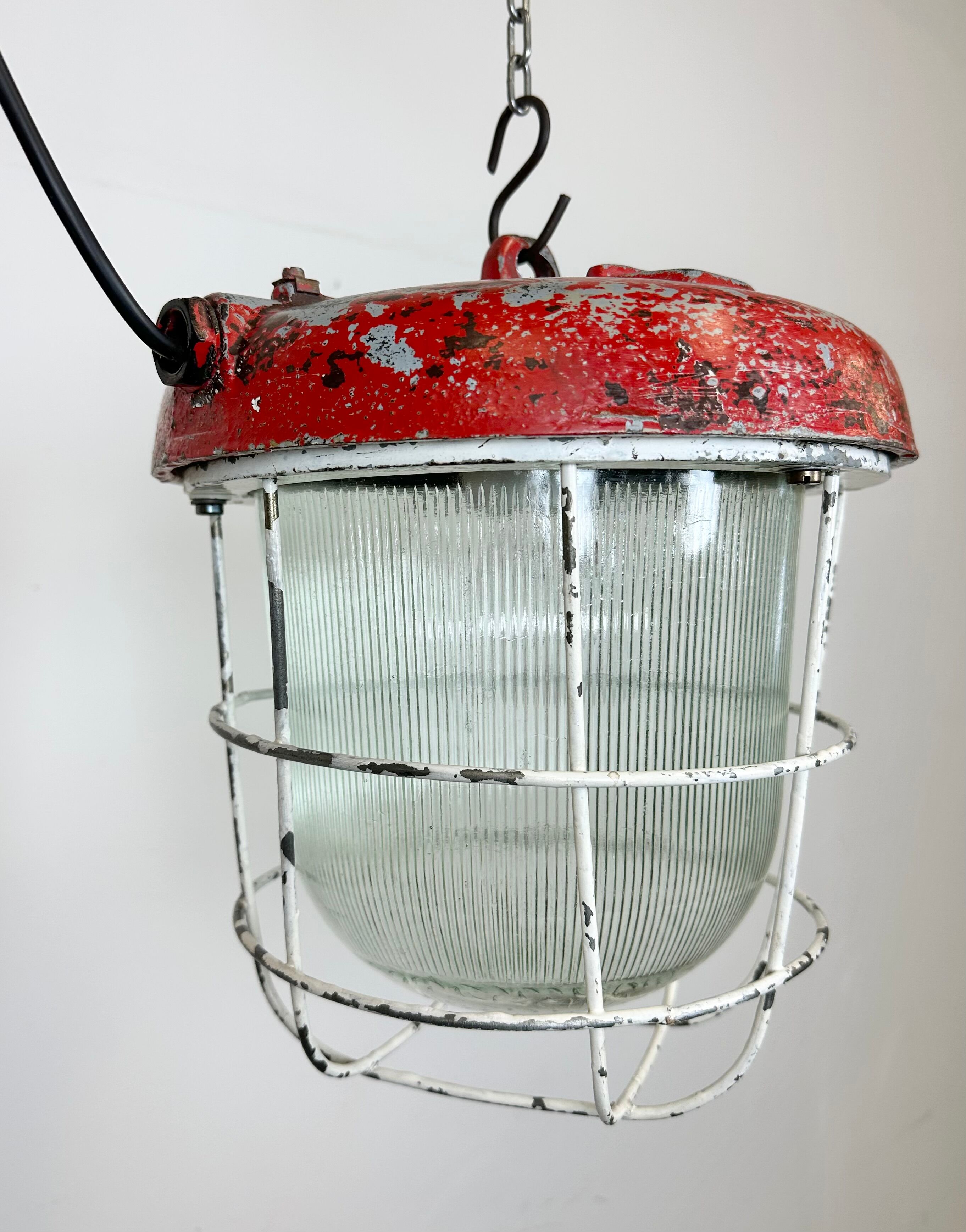 Red industrial cast iron cage pendant light, 1960s