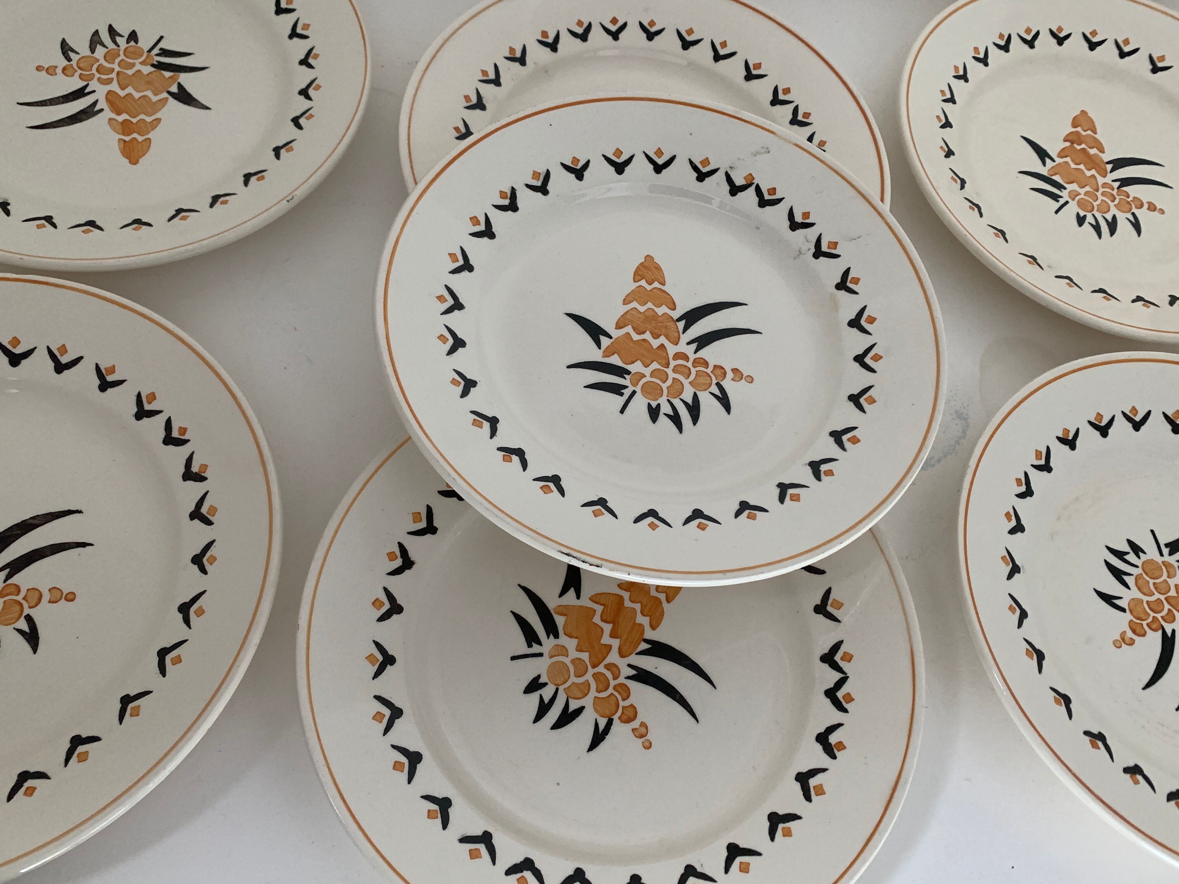 7 dessert plates and one Longwy dish
