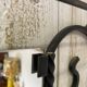 Wall-mounted coat rack with its mirror.
