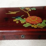 Old lacquered wooden box with china or japan decoration, bird and flower
