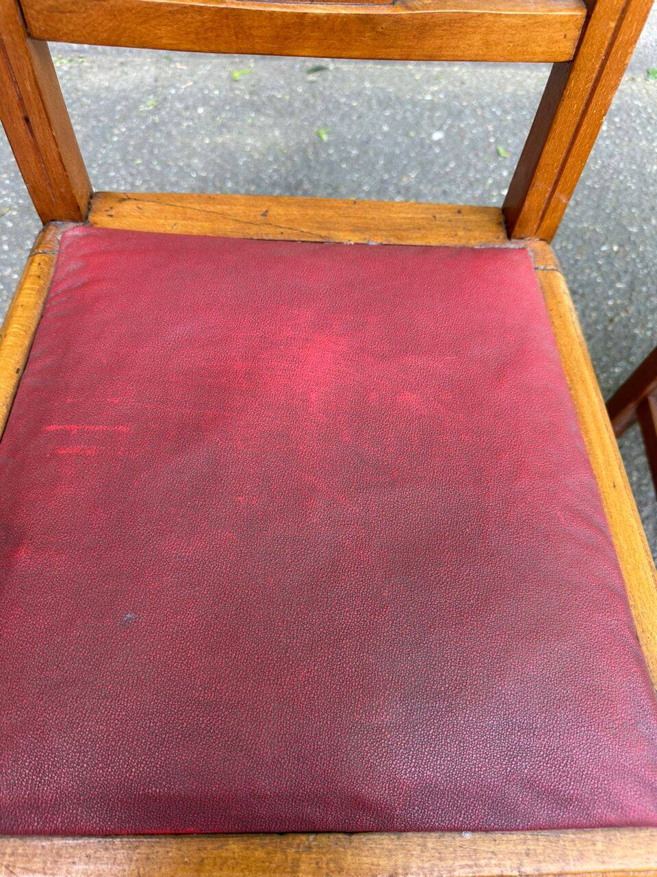 Pair of Art Deco chairs in solid oak and burgundy leather from around 1940.
