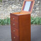 Chest of drawers with integrated mirror