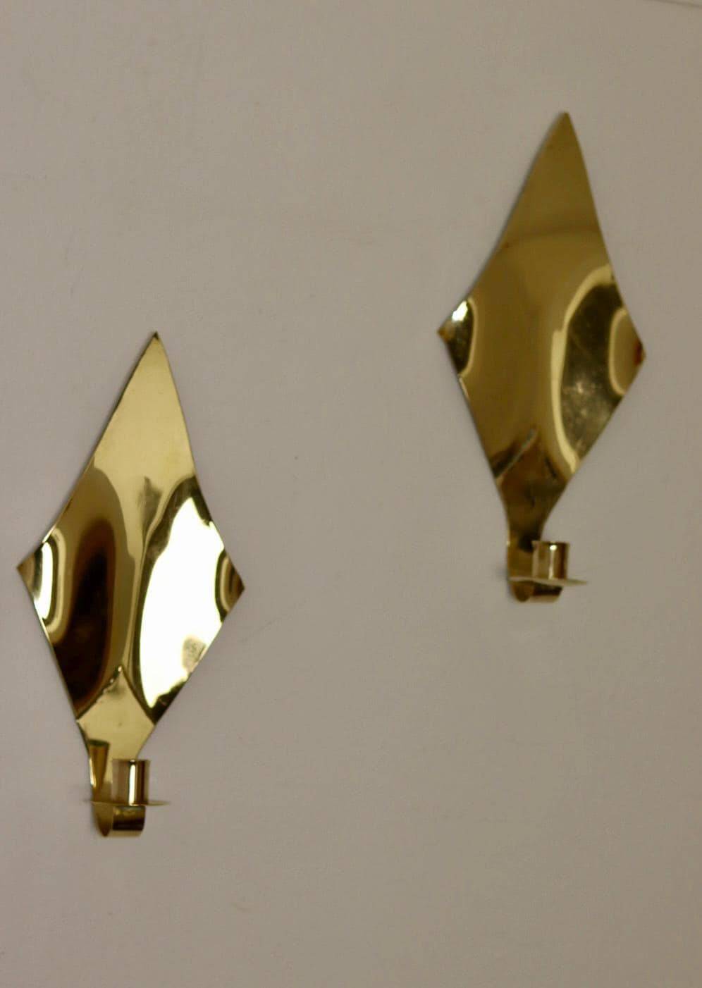 Pair of Swedish brass wall sconces from the mid-century.