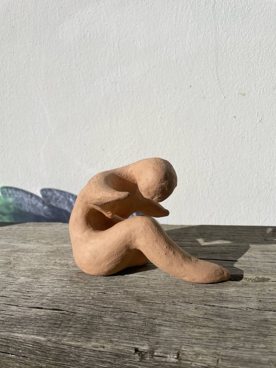 Terracotta sculpture figurine of a woman
