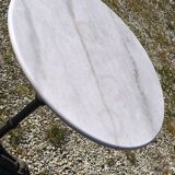Marble bistro table with cast iron legs in Parisian café style