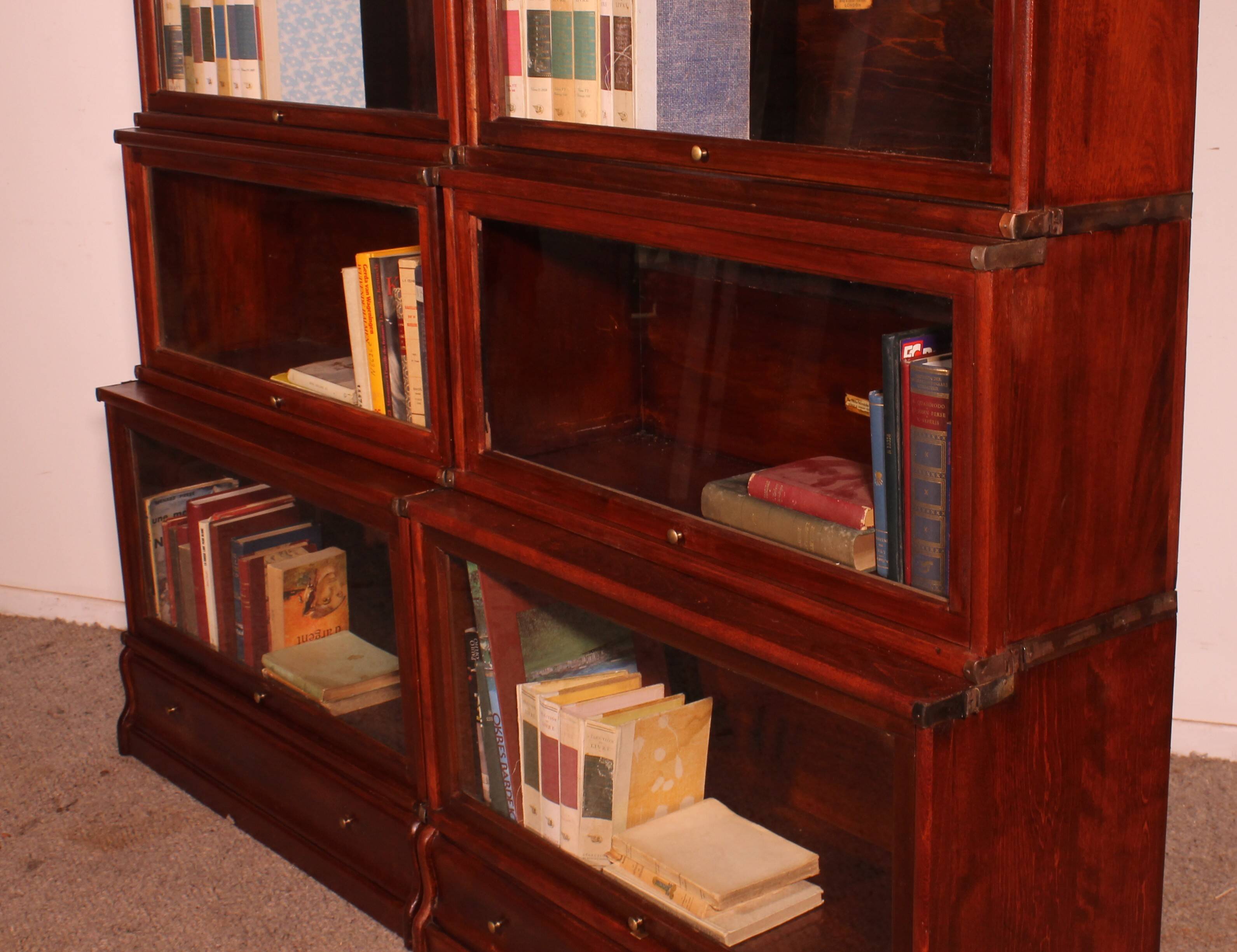 pair of Globe Wernicke London bookcases known as waterfall in mahogany circa