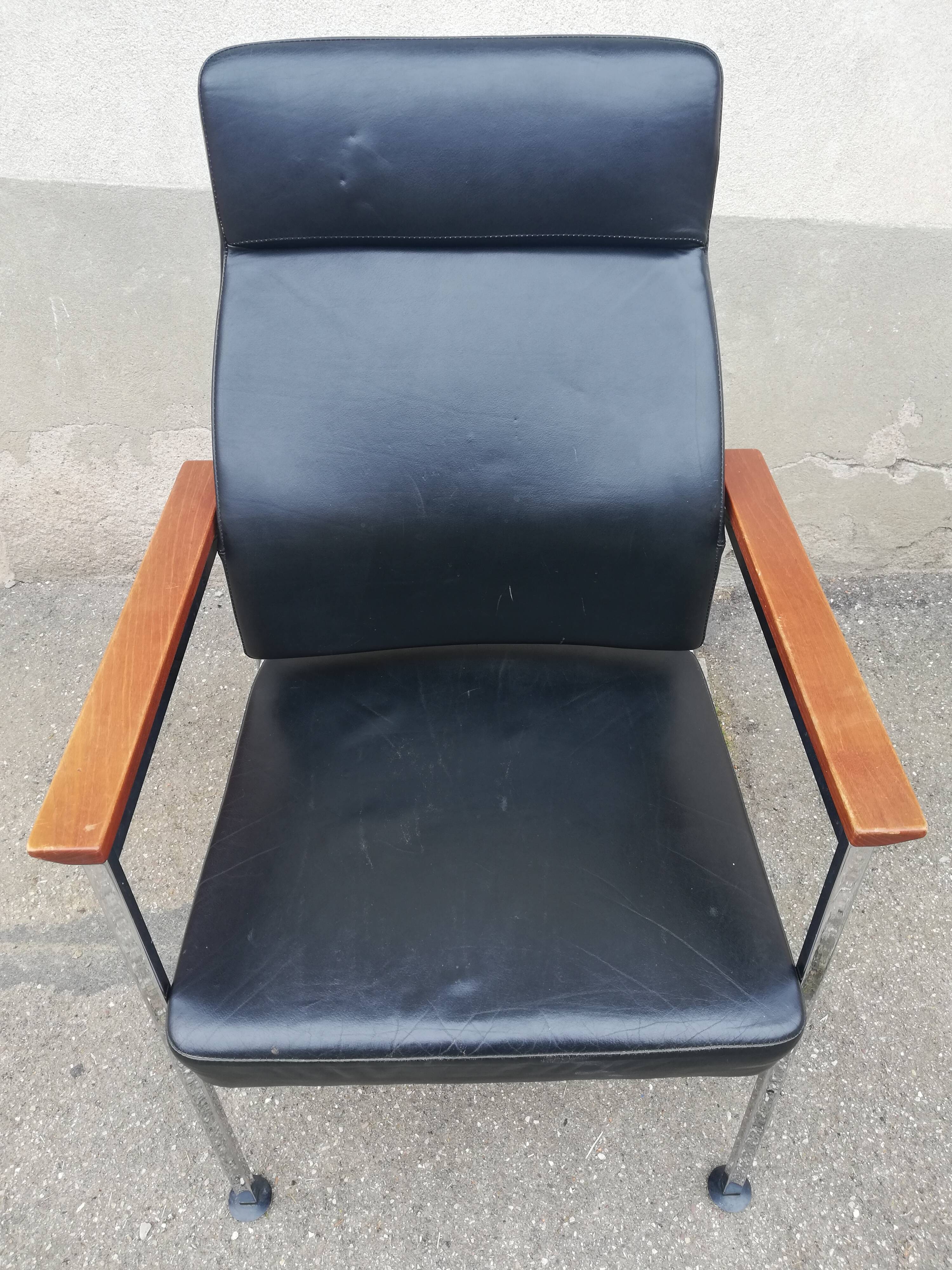 Vintage leather and teak armchair