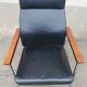 Fauteuil vintage cuir et teck
