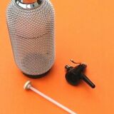 Seltz water siphon Glass body harmoniously meshed with translucent filaments