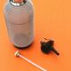 Seltz water siphon Glass body harmoniously meshed with translucent filaments
