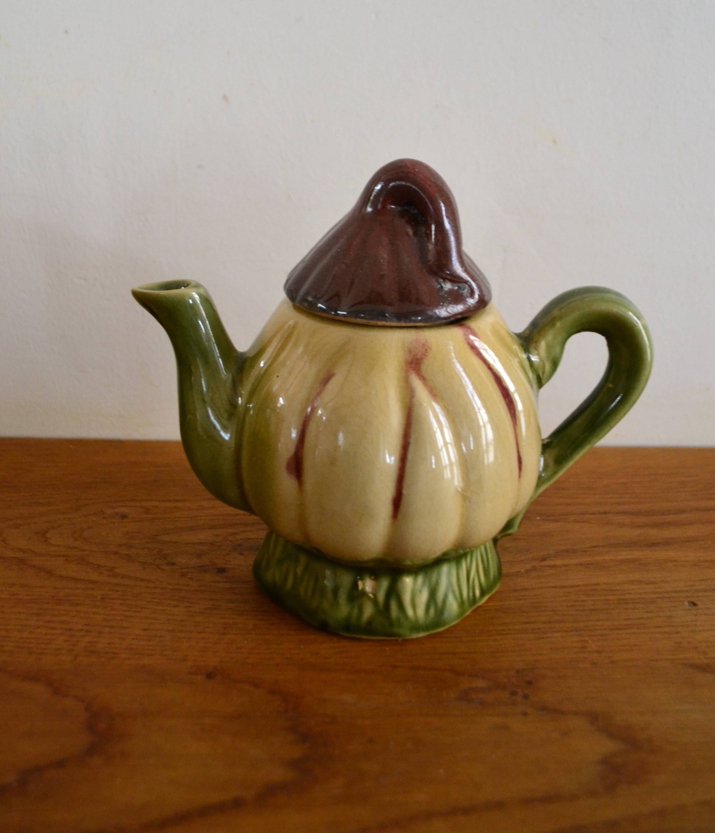 Small vintage earthenware teapot