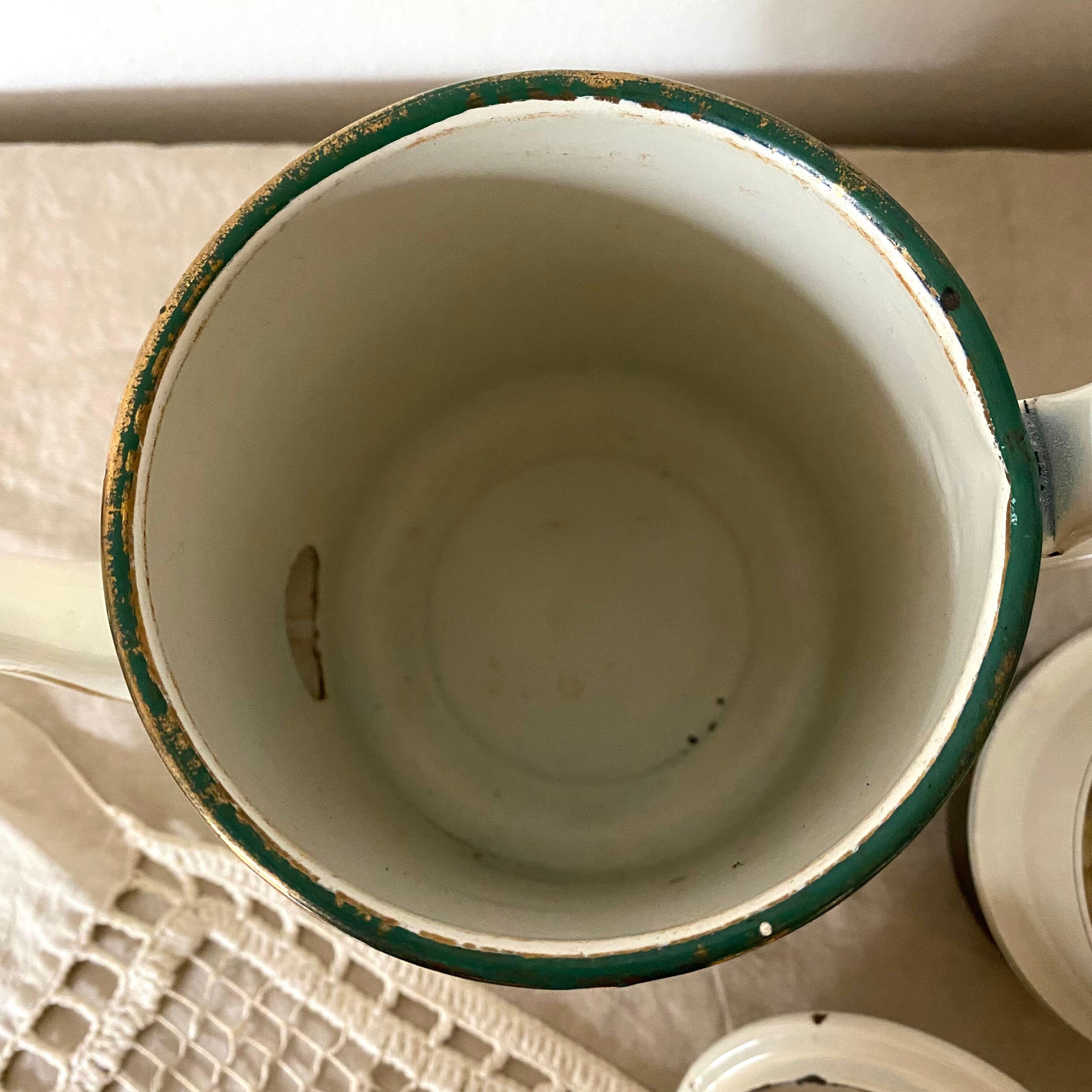 Antique coffee maker in enamelled sheet metal