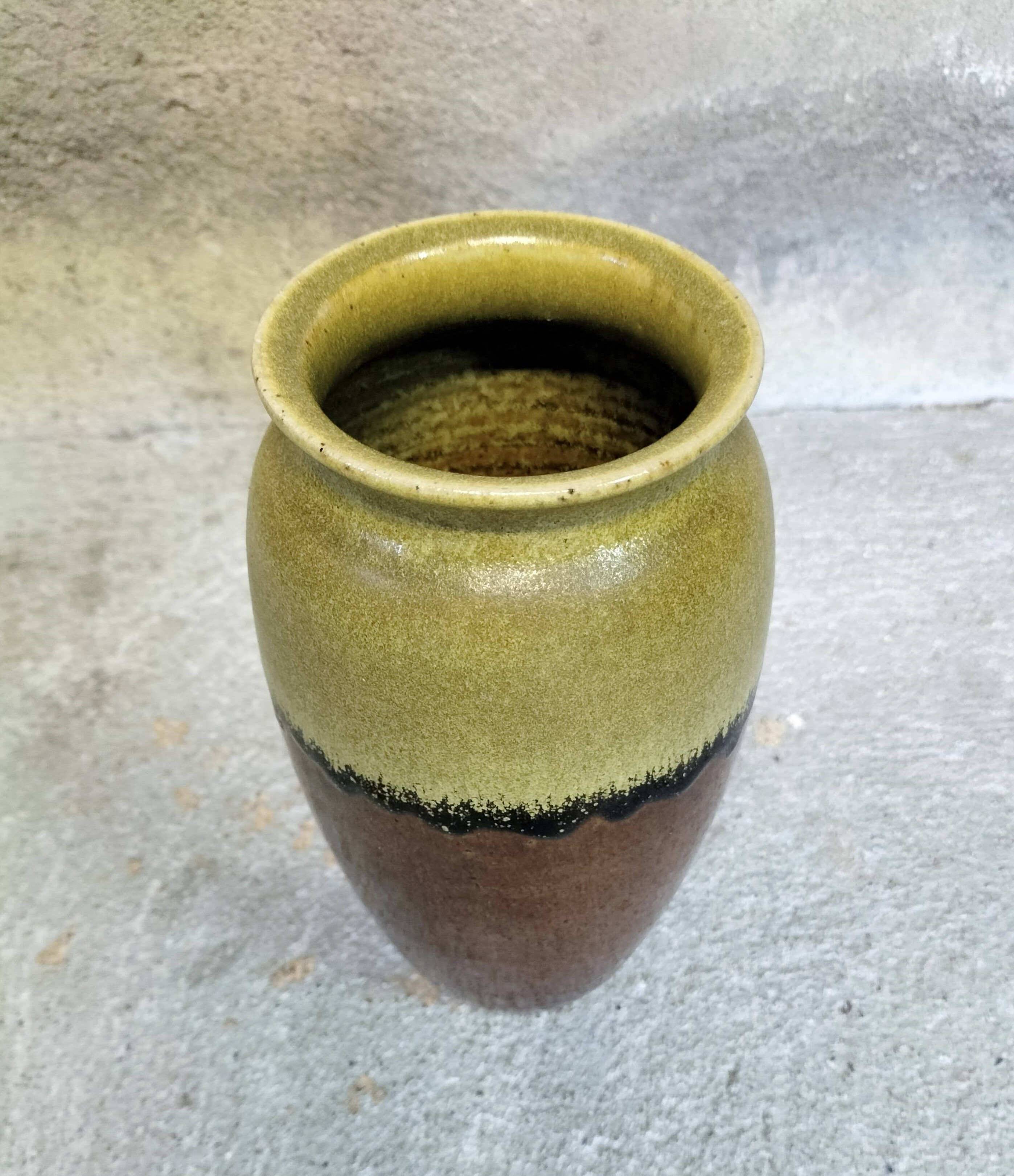 Lime green, black and brown ceramic vase.