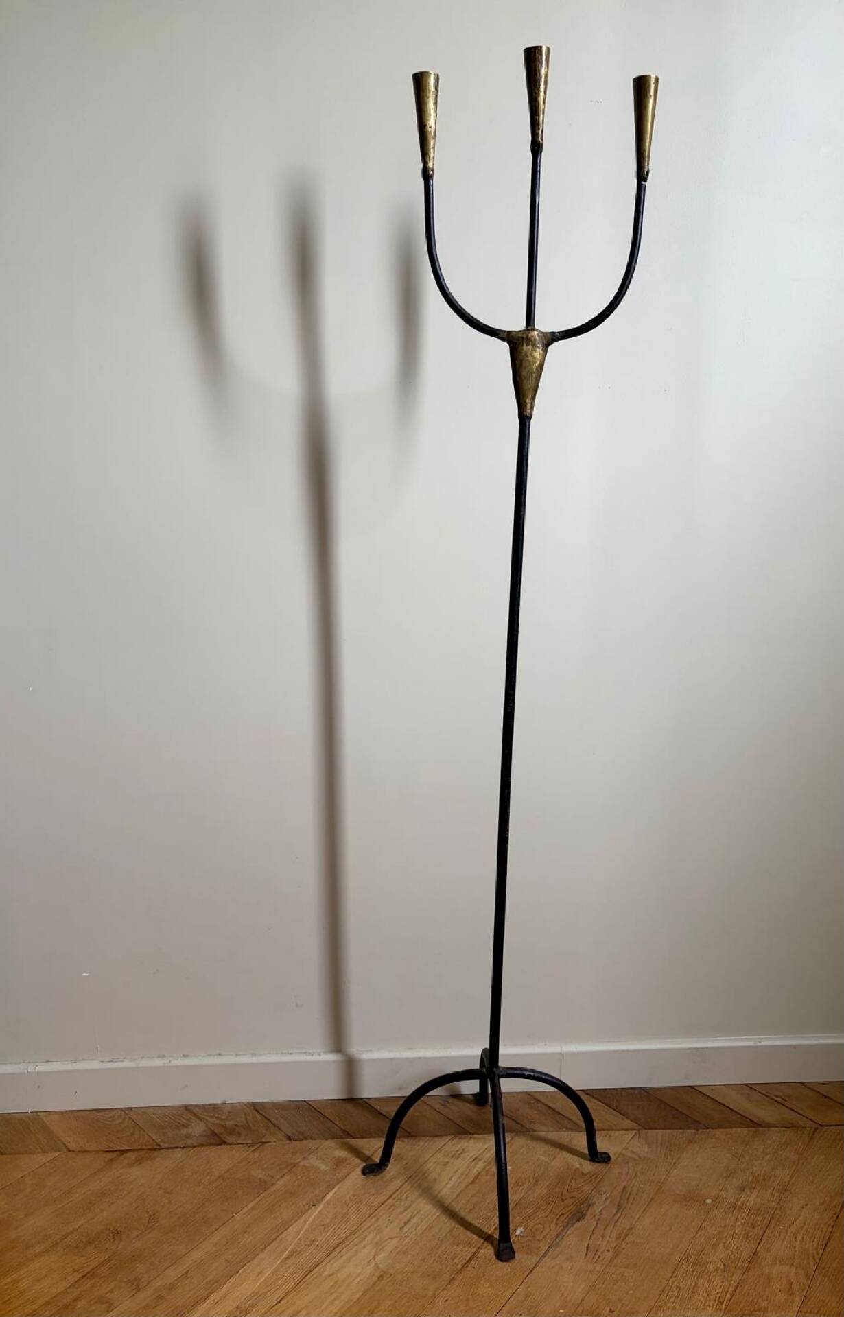 Candelabrum for the floor in wrought iron and brass.