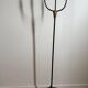 Candelabrum for the floor in wrought iron and brass.