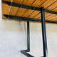 1950s coffee table in the style of Alain Richard, wood and metal.