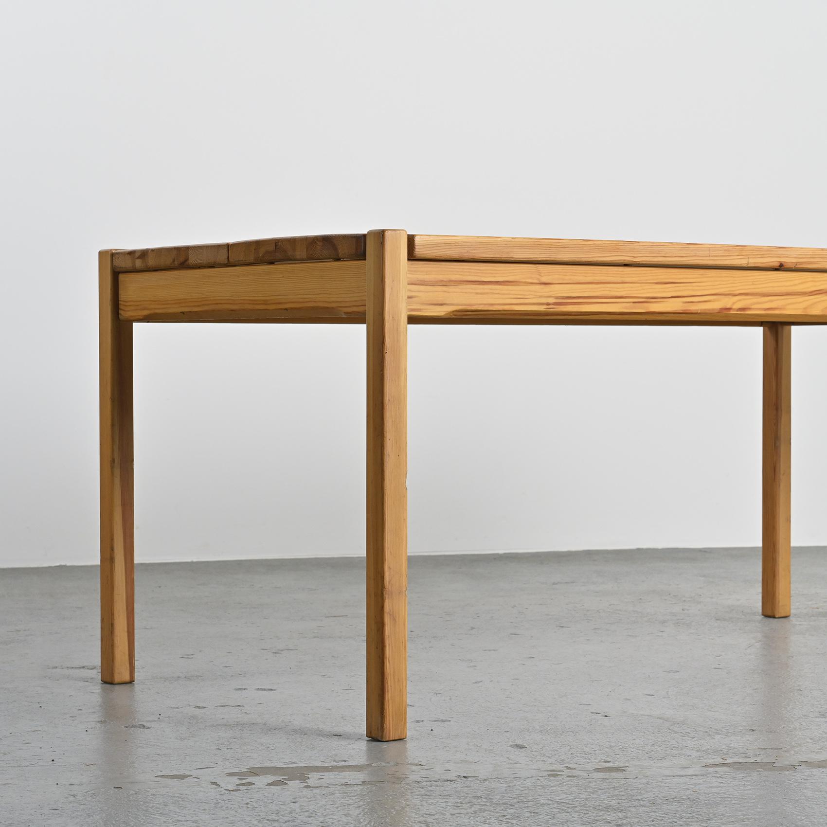 Table and two benches set in solid elm, France, circa 1980