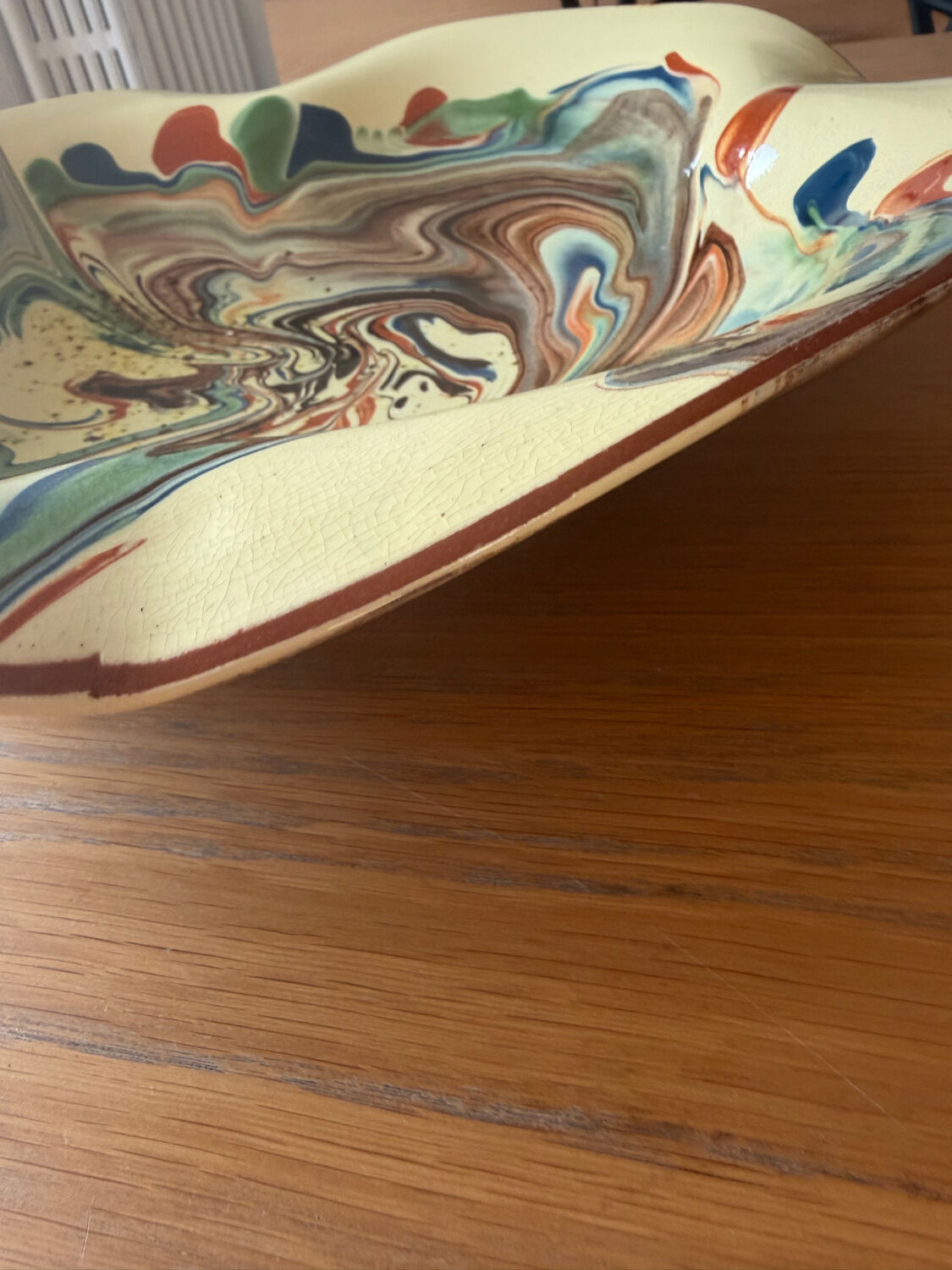 Glazed ceramic plate signed
