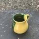 Vintage half-yellow and half-green glazed ceramic vase and pitcher