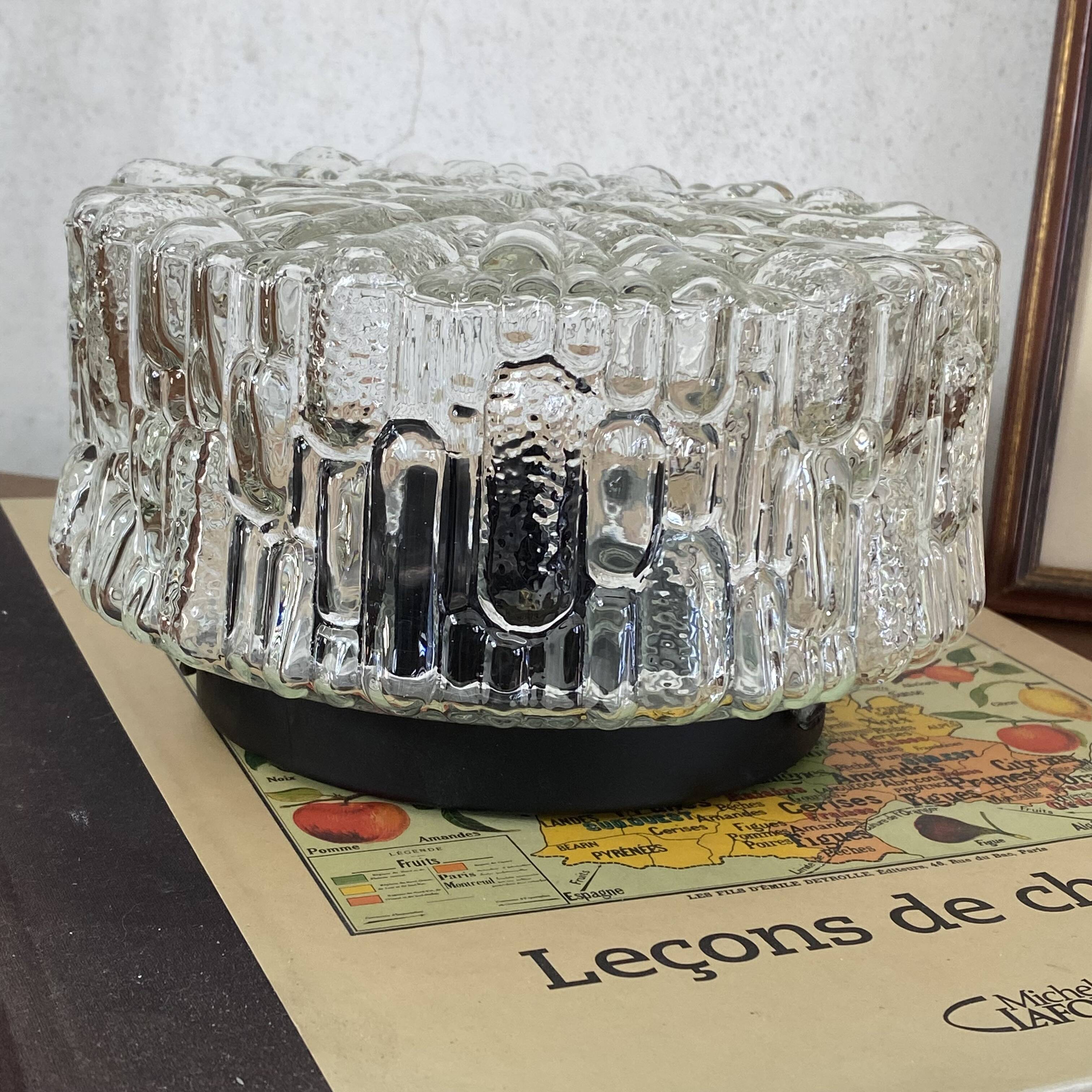 Round wall-mounted ceiling light, transparent moulded glass, vintage fixture.