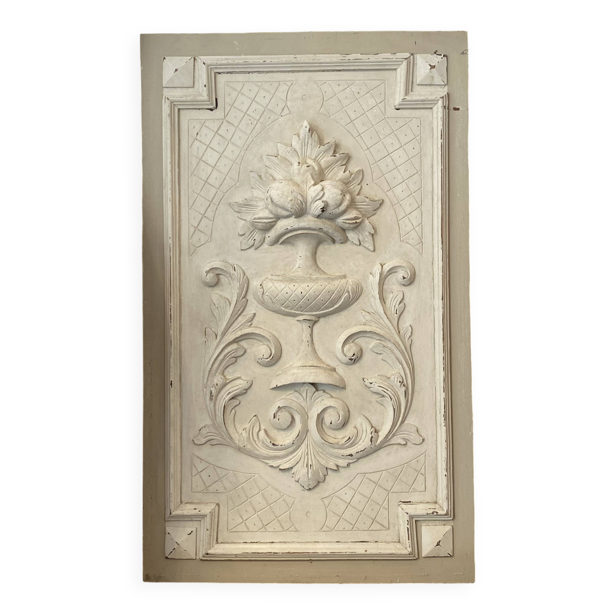 Old carved panel with patina