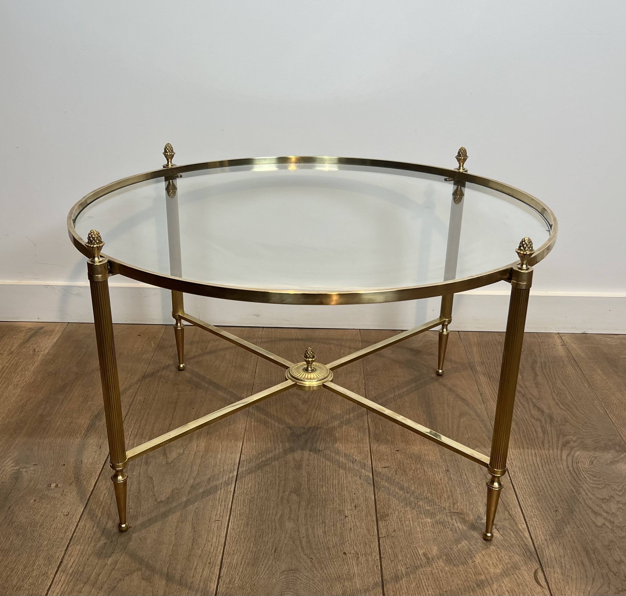 Neoclassical Round Coffee Table in Brass with Fluted Supports and Floral Motifs