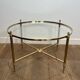 Neoclassical Round Coffee Table in Brass with Fluted Supports and Floral Motifs