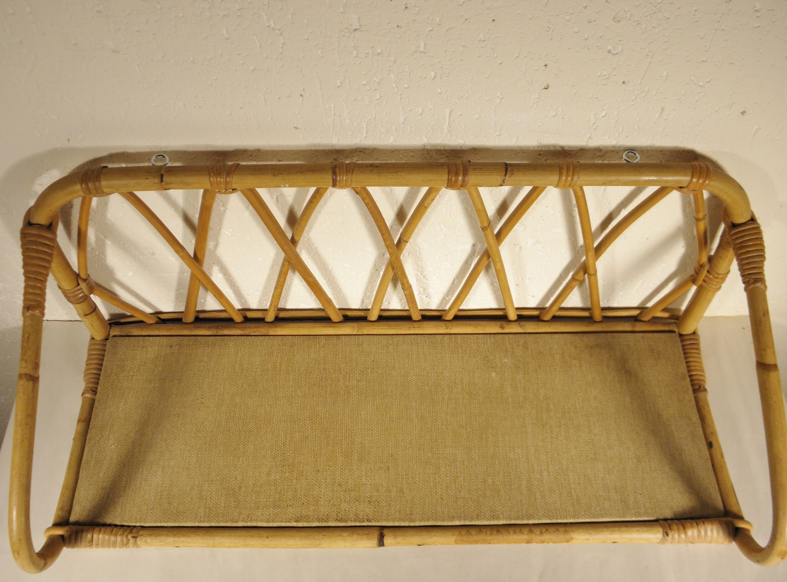 Rattan wall shelf