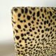 Vintage leopard print bed frame, Hollywood Regency style.