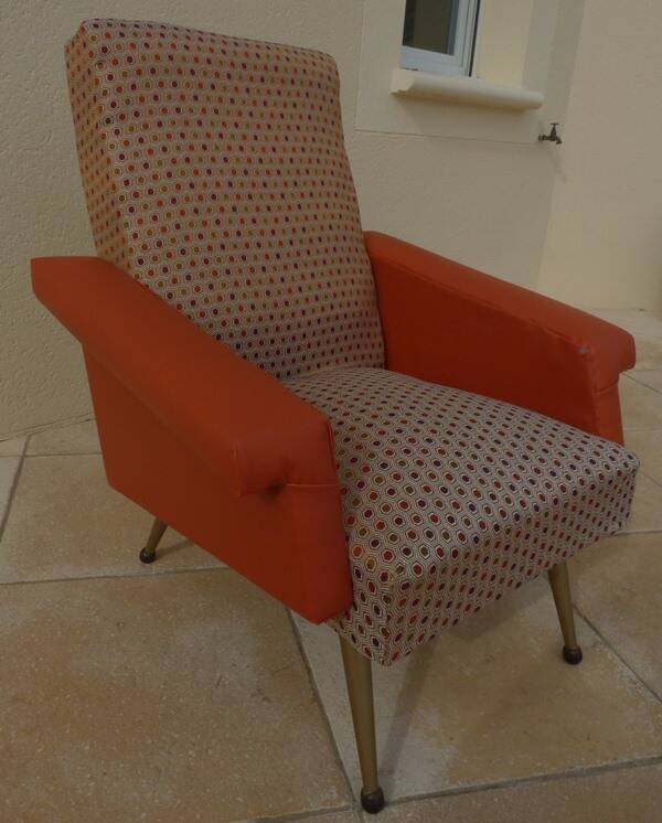 Retro vintage rockabilly armchair in orange faux leather and vintage fabrics