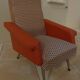 Retro vintage rockabilly armchair in orange faux leather and vintage fabrics