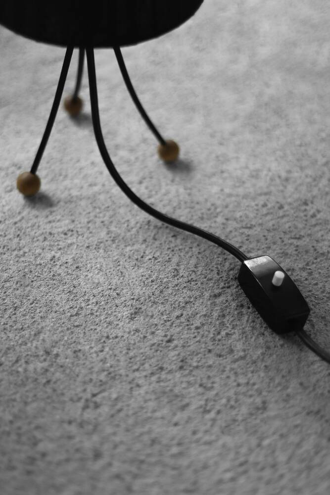 Small modern Polish table lamp from the mid-century with a black shade, 1960s.