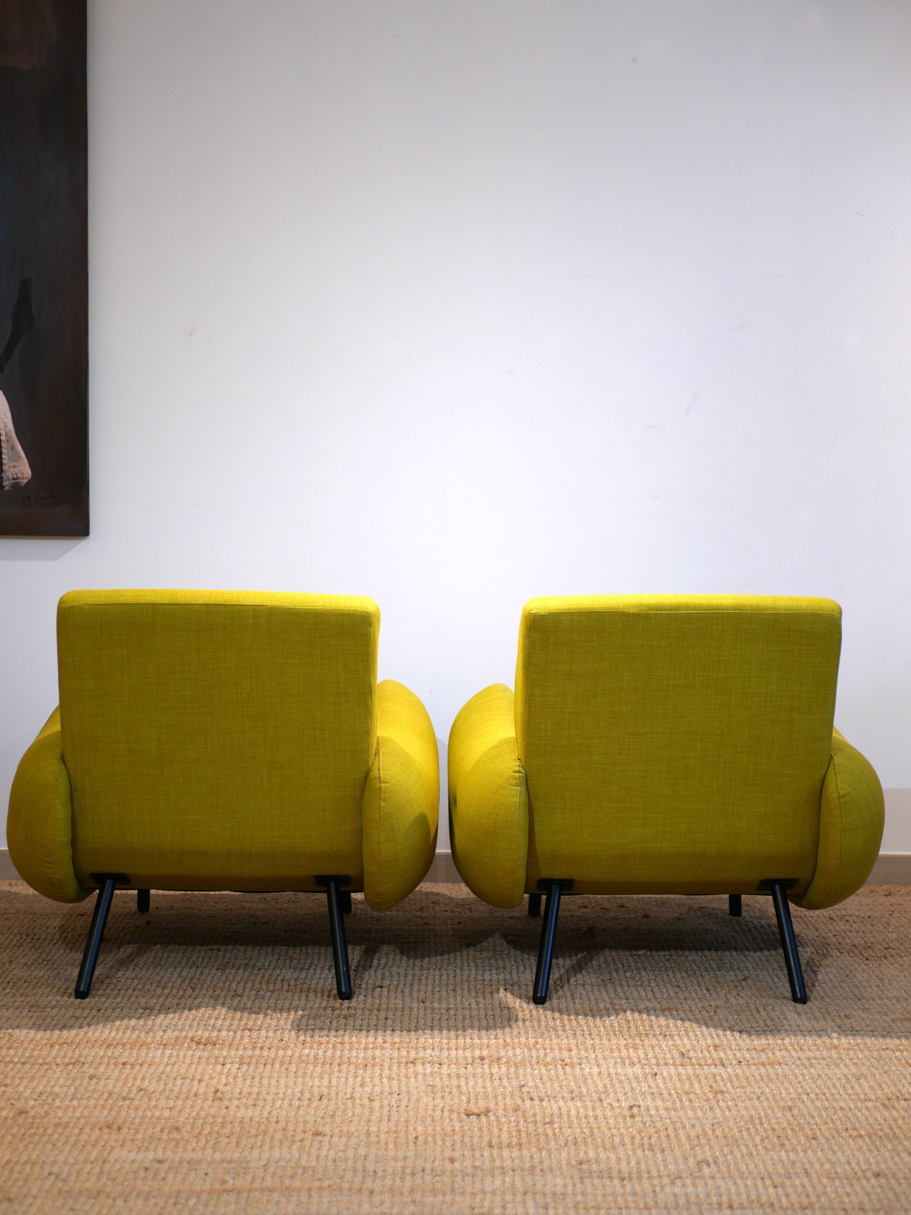Pair of low armchairs in 60s–70s style