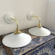 Set of two electrified white opaline wall lamps to nine