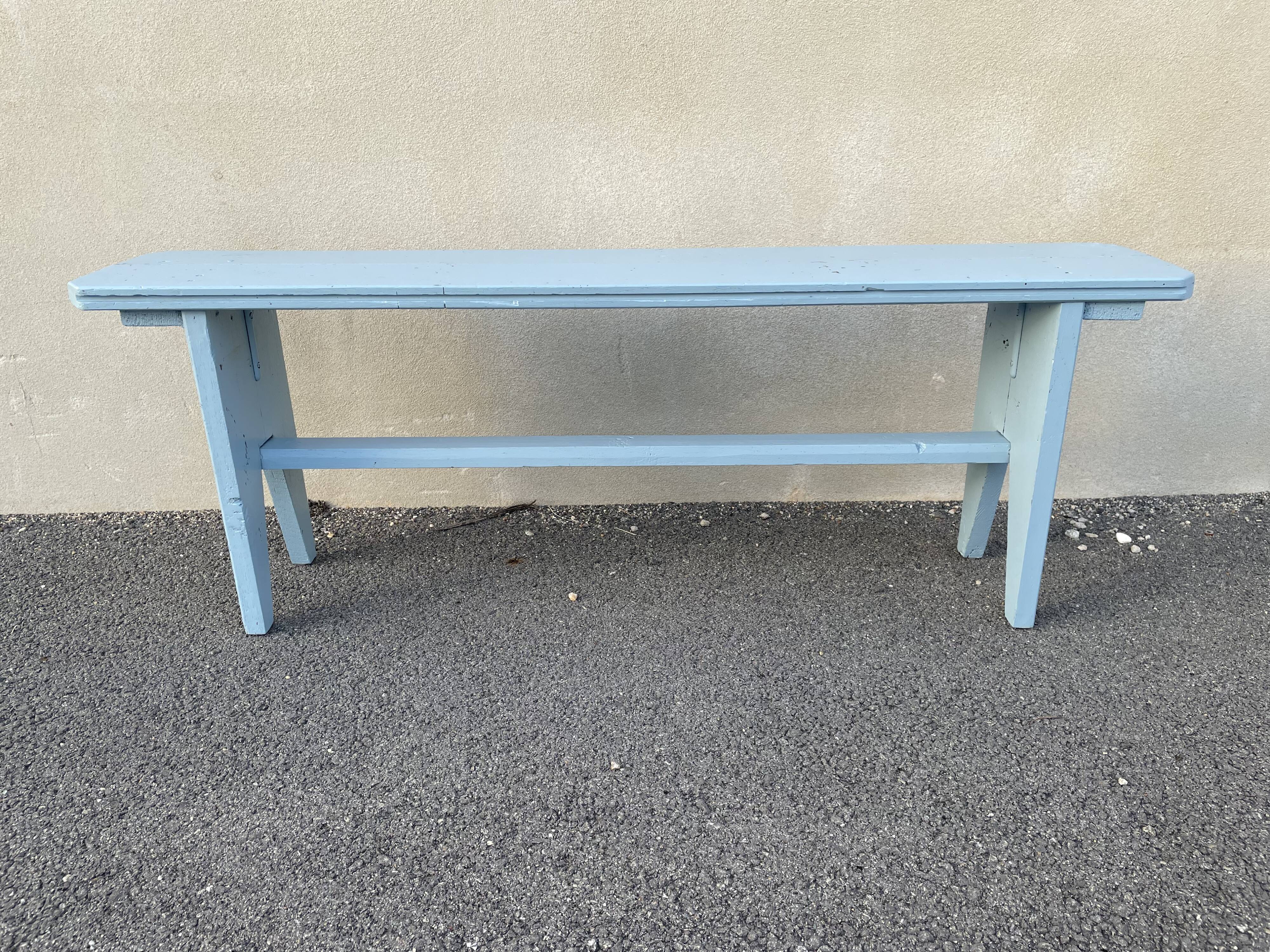 Blue painted wooden bench