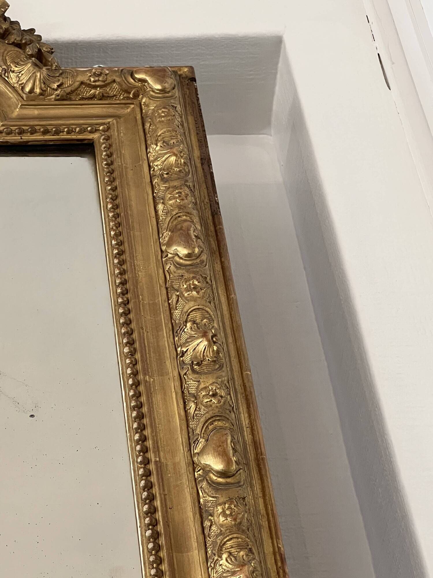 Antique mirror in wood and gilded stucco, Louis XV style, 19th century
