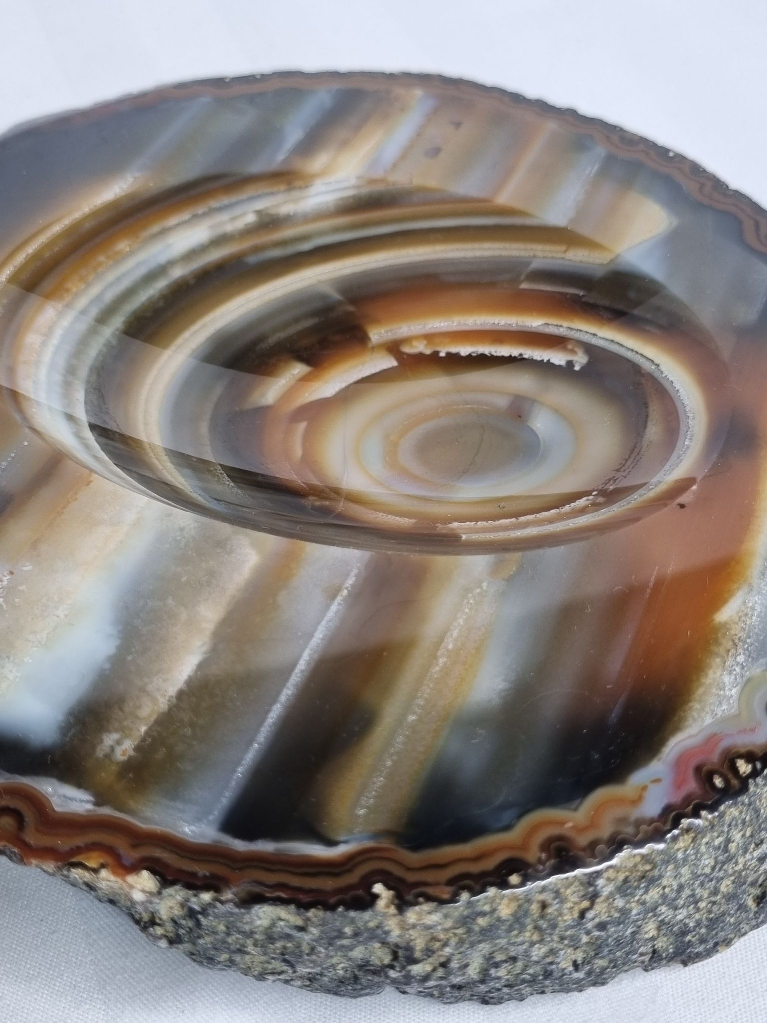 Empty pocket, slice of brown ochre agate