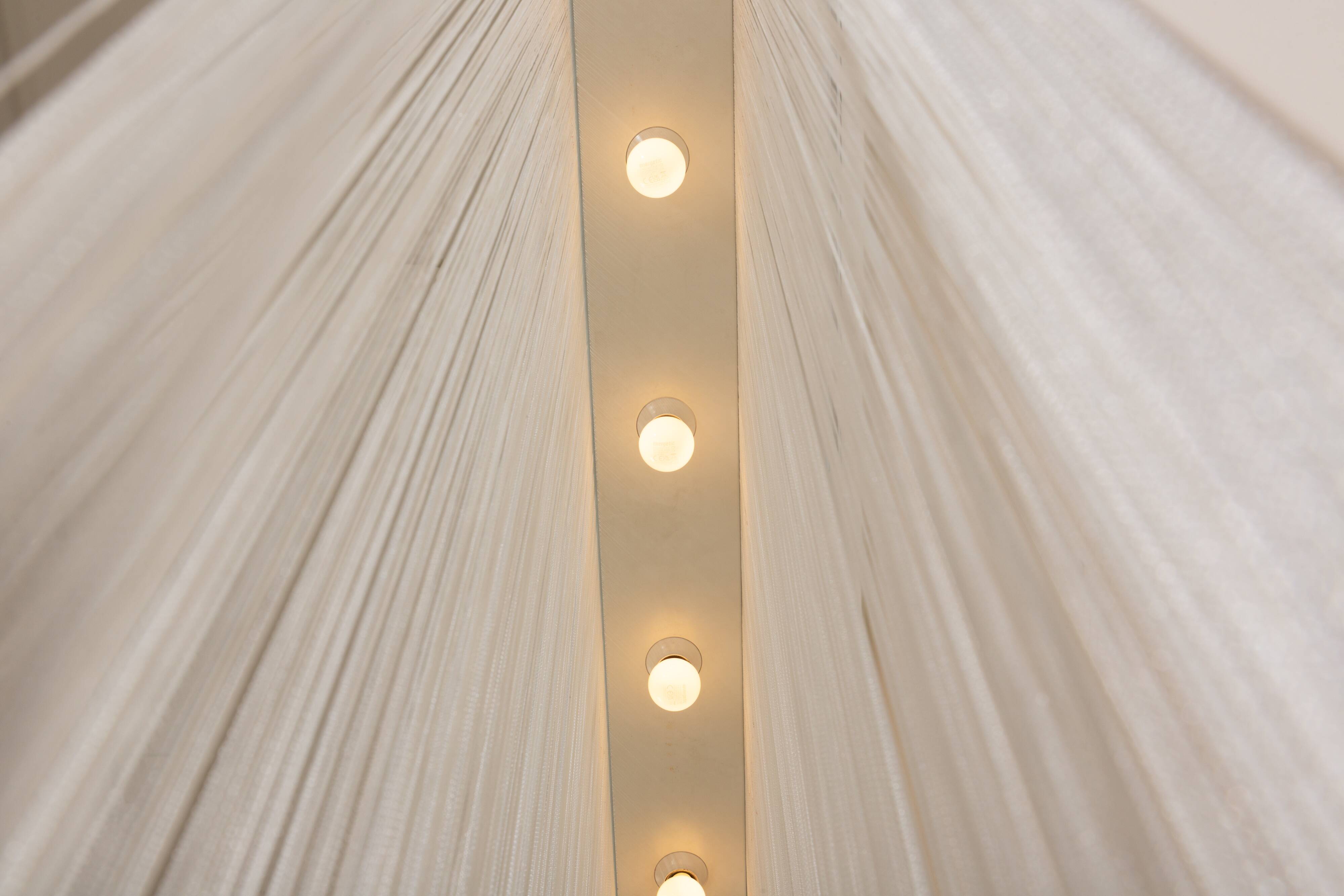 Pair of Mariyo Yagi Garbo chandeliers, metal and nylon, 1970s.